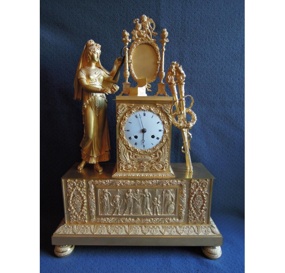 Pendule à la mariée en bronze doré, début XIXe