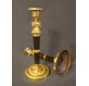 Paire de bougeoirs époque Empire en bronze doré