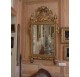 Mirror with gardener's tools in gilded and carved wood, Louis XVI period
