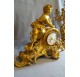 Chiseled and gilded bronze fireplace clock set