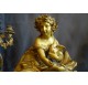 Chiseled and gilded bronze fireplace clock set