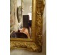 18th century carved and gilded wooden pediment mirror