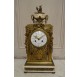 Louis XVI style cage clock in gilded bronze by Vincenti ​