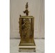 Louis XVI style cage clock in gilded bronze by Vincenti ​