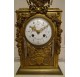 Louis XVI style cage clock in gilded bronze by Vincenti ​