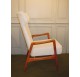 Fauteuil scandinave en hêtre à haut dossier type "wingback"