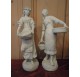 Pair of white china signed G. Levy : young peasant girls