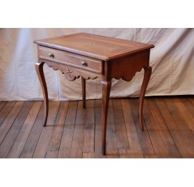 Walnut table, Louis XVI era, 18th c.